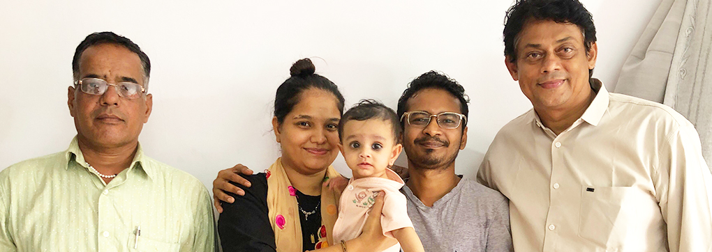 A happy family after using mySunar's ear piercing service in Ahmedabad