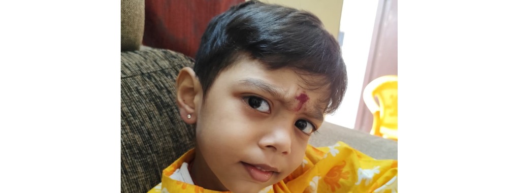 A happy family after completing baby ear piercing service in Chennai.