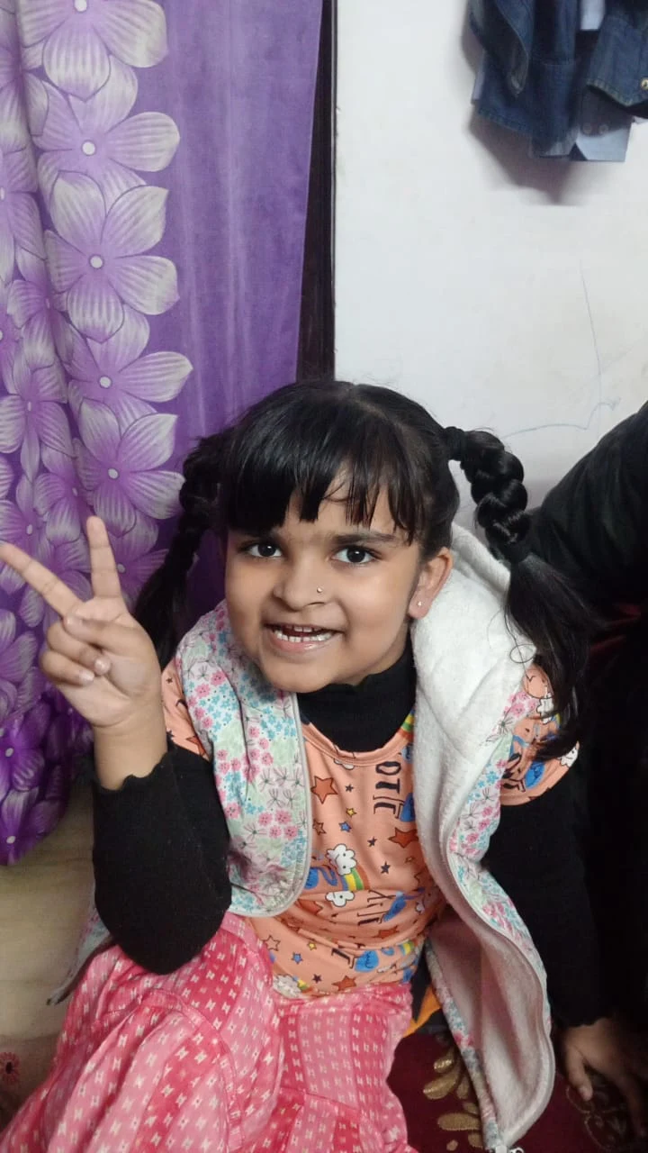 A happy family after using mySunar's ear piercing service in Delhi