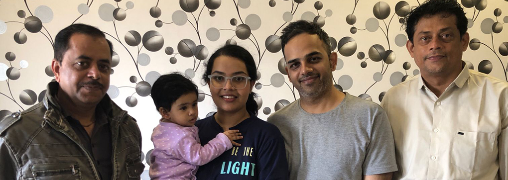 A happy family after using mySunar's ear piercing service in Indore