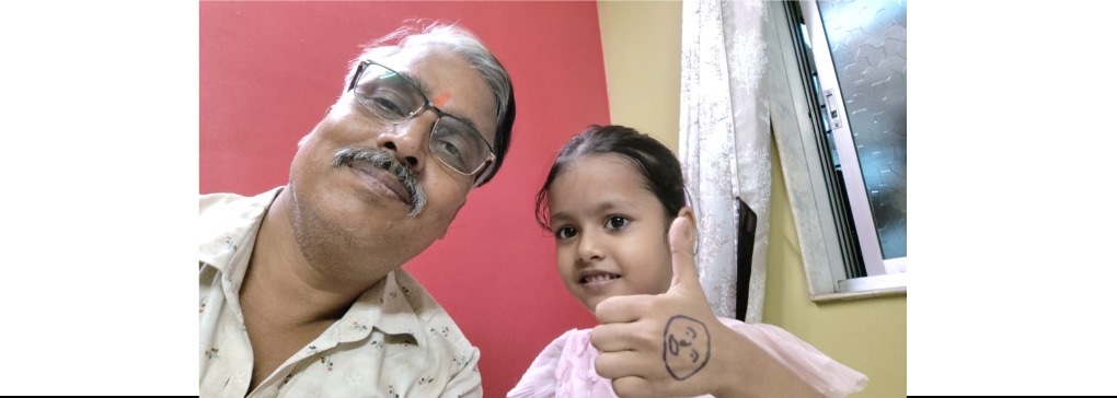 Baby with parent after ear piercing in a calm home environment