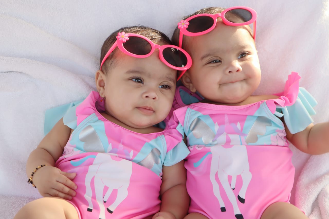 A happy family after using mySunar's ear piercing service in Vadodara