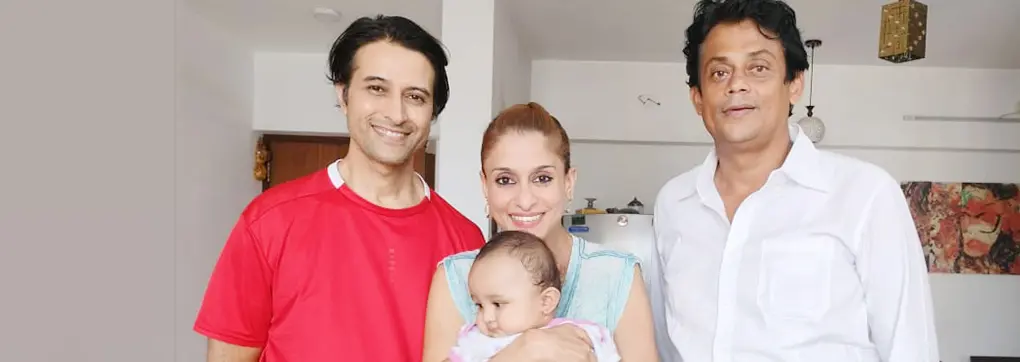 Happy family after baby ear piercing - mySunar Australia NRI service