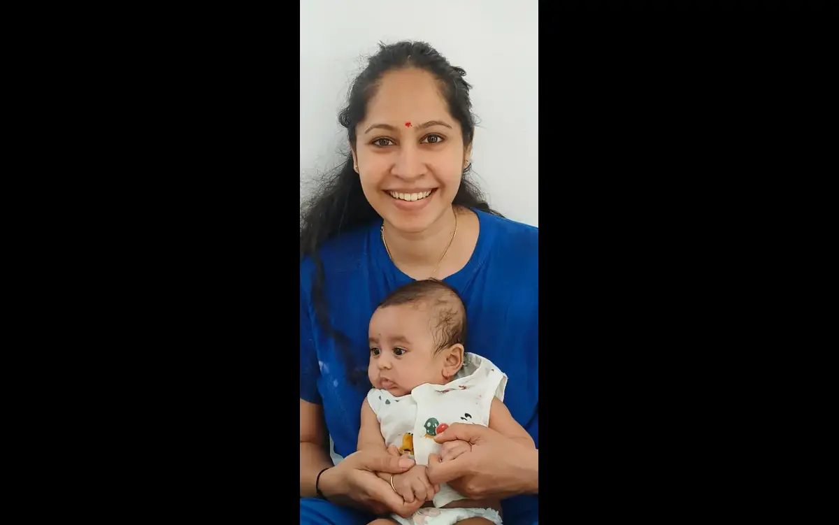Happy family after baby ear piercing - mySunar Singapore NRI service