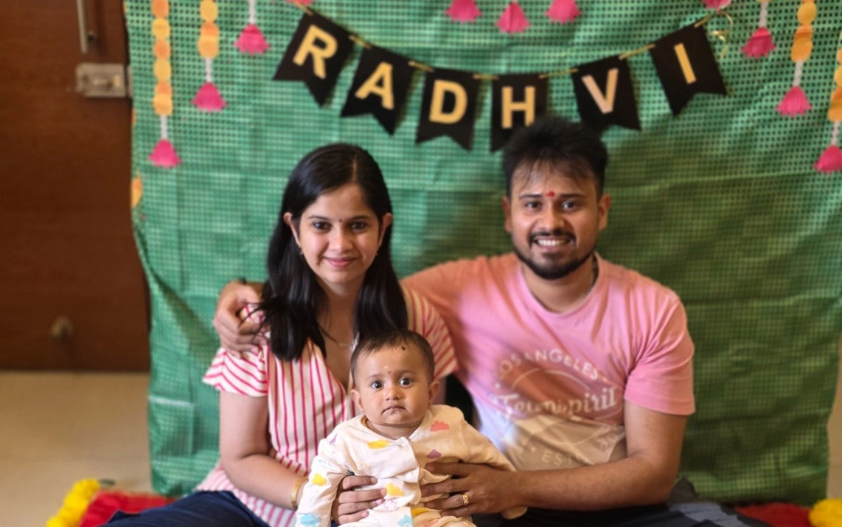 Happy family after baby ear piercing - mySunar USA NRI service